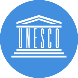 Logo resmi UNESCO, lembaga PBB yang berfokus pada pendidikan, ilmu pengetahuan, dan kebudayaan.